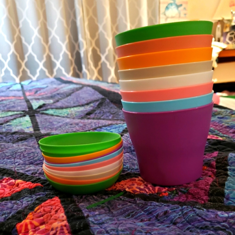 Eight starter pots and bottoms